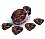 Blikje of display + plectrums van doodshoofd skeletten