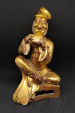 Een Chinese verguld bronzen figuur van een buitenlandse, Antiek en Kunst