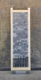 Drukblokken - een letterbak met een volledig alfabet 28 punt