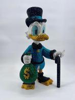 Okyes (1987) - Scrooge Mcduck Money Bag Blue Edition, Antiek en Kunst