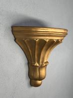 Goudkleurige keramieken wandconsole – klassiek geïnspireerd