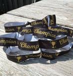 Elastische armband/haarelastiek Champion zwart of wit + goud, Verzenden, Nieuw, Overige typen