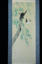 Swallow and willow tree with wooden storage box