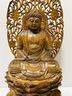 Fine sculptured wooden Amida Nyorai statue sitting on lotus