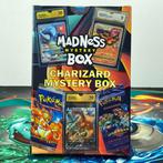 Madness Mystery Box - Charizard Graded Card + 2 Boosterpacks, Hobby en Vrije tijd, Verzamelkaartspellen | Pokémon, Nieuw
