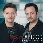 - Herztattoo - der moment (CD), Ophalen of Verzenden, Nieuw in verpakking