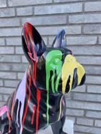 Beeld, pub or French bulldog black sitting in color paint