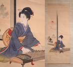 Japanse schoonheid - Een vrouw in een kimono die de koto