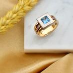 18 Krt. Bicolor gouden ring met topaas en diamanten | 0,1..., Sieraden, Tassen en Uiterlijk, Ringen, Gebruikt, Overige kleuren