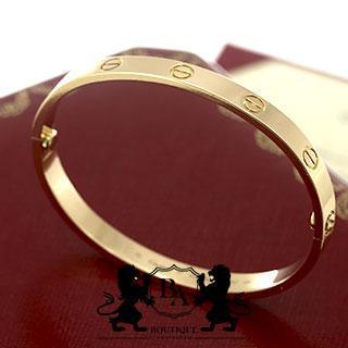 Cartier LOVE armband small van 18 karaat geelgoud met 6 diamanten