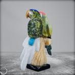 Prachtige vogels op standaard (lapis lazuli, serpentin,