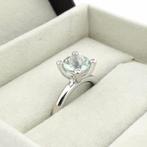 Witgouden Phlox ring gezet met aquamarijn en diamanten;..., Gebruikt, Overige kleuren, Ophalen of Verzenden, 17 tot 18