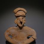 Colima, Westkust Mexico Terracotta Zittend figuur. 9 cm H.