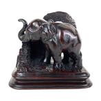 Olifant boekensteun - Art déco - Indonesië - Verbronsd