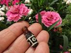Zelfgemaakte meditatiemalâ DZI 9 ogen (26 mm) met