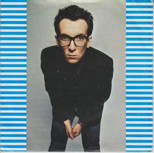 vinyl single 7 inch - Elvis Costello - Watching The Detec..., Cd's en Dvd's, Vinyl Singles, Zo goed als nieuw, Verzenden