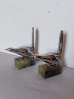 Boekensteunen (2) - Metaal en marmer