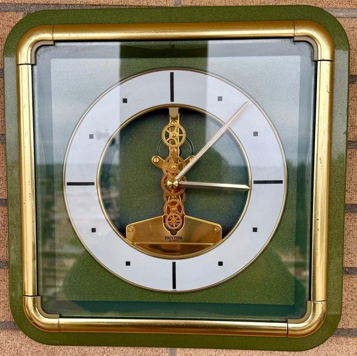 Klok - Rhythm - - goudkleurig metaal, hoogkwalitatieve harde, Antiek en Kunst, Curiosa en Brocante