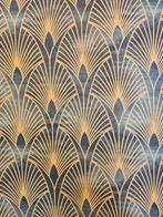 Groen vervaagd textiel met Art Deco-waardig motief in goud,