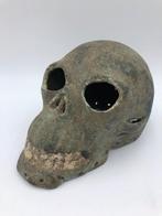 Onderdeel van een Afrikaans grafmonument Gesneden schedel -