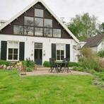 Tussenwoning met tuin, balkon en inloopdouche, Heelsum