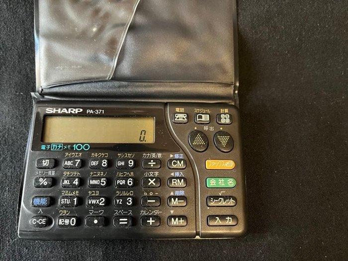 Sharp - Rekenmachine - 1980-1990, Spelcomputers en Games, Spelcomputers | Overige Accessoires