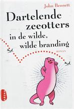Dartelende zeeotters in de wilde, wilde branding, Verzenden, Zo goed als nieuw, John Bennett