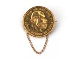 Broche met gouden tien gulden munt Willem de Derde (1879), Gebruikt