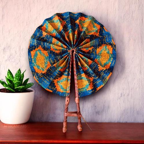 Afrikaanse handwaaier - Ankara print waaier - Komla - Oranje, Huis en Inrichting, Woonaccessoires | Wanddecoraties, Nieuw, Ophalen of Verzenden
