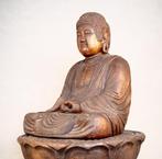 The seated statue of Shakyamuni Buddha  - Beeld Hout -