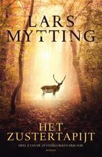 De zusterklokken-trilogie 2 - Het zustertapijt, Verzenden, Nieuw
