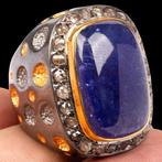 Zilver met vergulde afwerkingen. Ring met Cabochon Tanzanite