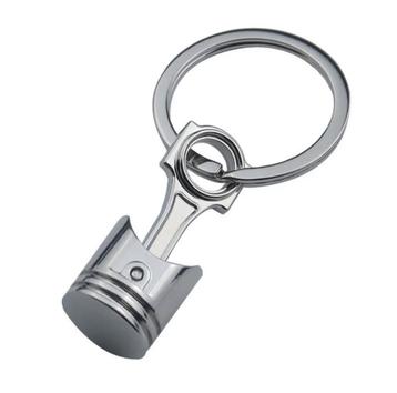 Piston sleutelhanger zuiger beschikbaar voor biedingen
