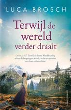 Terwijl de wereld verder draait | 9789021048482 | Luca, Zo goed als nieuw, Luca Brosch