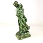 Art Deco sculpture depicting a kneeling Saint - UT VITAM