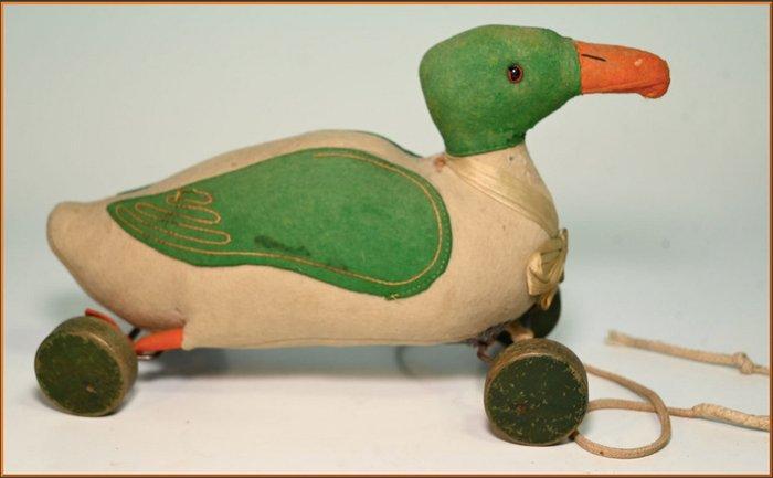 Steiff - Pluche speelgoed Ente auf Rädern Ziehspielzeug MIT, Antiek en Kunst, Antiek | Speelgoed