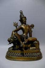 Lord Shiva zittend op een leeuw - Brons - Nepal - 20e eeuw