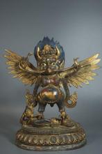 This is a bronze 30 cm tall statue of the Garuda - Brons -