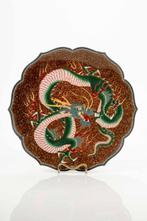 Schotel - A circular and lobed cloisonné plate depicting a