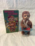 T.N - Opwindbaar blikken speelgoed Ironing monkey wint up -