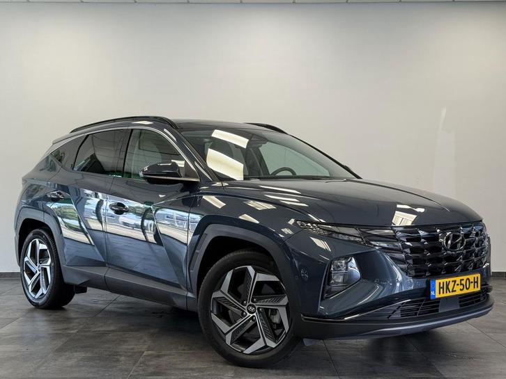 Zakelijke Lease |  Hyundai Tucson 1.6 T-GDI PHEV Premium Sky, Auto's, Hyundai, Onderhoudsboekje, Lease, Grijs, Automaat, SUV of Terreinwagen
