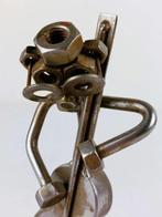 Figuur - Set van vier metalen muziekinstrumentenfiguren