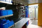 Werkplaats met wandrek - Werkcontainer met stellingen