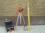 roterende laser met baak , ontvanger en statief , nivilerend