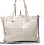 Chanel ¨New Traveline¨ schoudertas Leder/Canvas