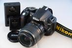 Nikon D3100 met 18-55mm VR kitlens en grip in TOP STAAT, Gebruikt, Spiegelreflex, Ophalen of Verzenden, Nikon