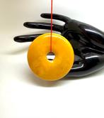 Grote Baltische barnsteenhanger, donutvormige amulet, 53 mm,