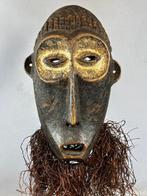 Old African mask from the Lega Bwami - Congo.