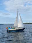 Sportieve kajuitboot Etap 22 met stallingstrailer
