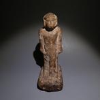 Oud-Egyptisch Limestone Beeld van een man. 15 cm lang. Derde